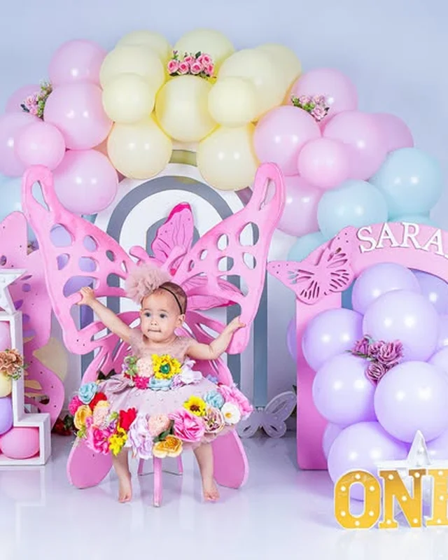 First birthday photoshoot, butterfly wing backdrop