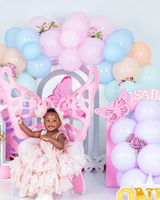 First birthday photoshoot, butterfly wing and balloon arch