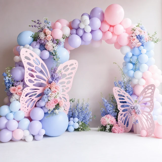 Butterfly wing themed birthday balloon arch, illustrative inspiration image