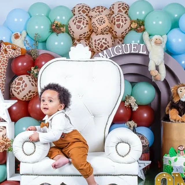 Safari themed birthday setup with giraffes